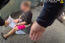 Body camera footage shows the moment an LMPD officer hands a woman in labor a citation for unlawful camping as she waits for an ambulance.