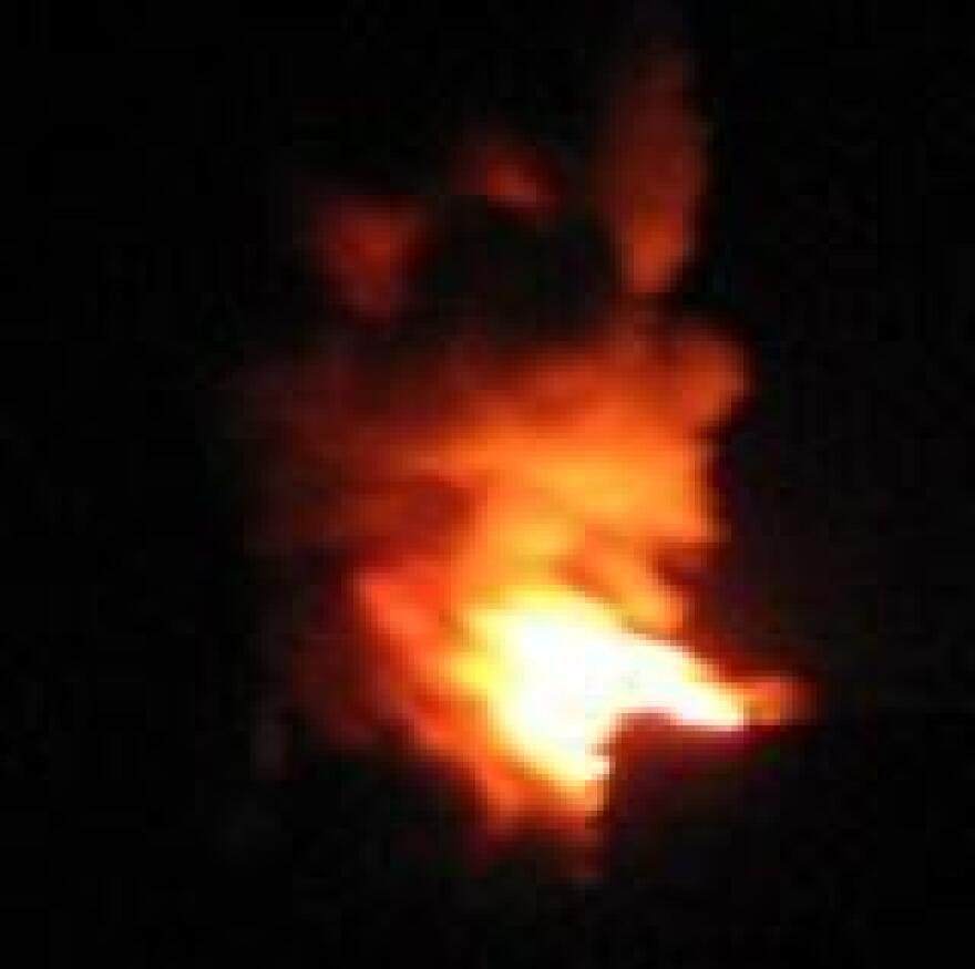 The fire at Magellan Midstream Partners fuel distribution facility continues to burn throughout the night.