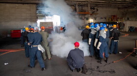 Photo from U.S.S. George Washington Facebook. Sailors complete a number of jobs during the refueling process.