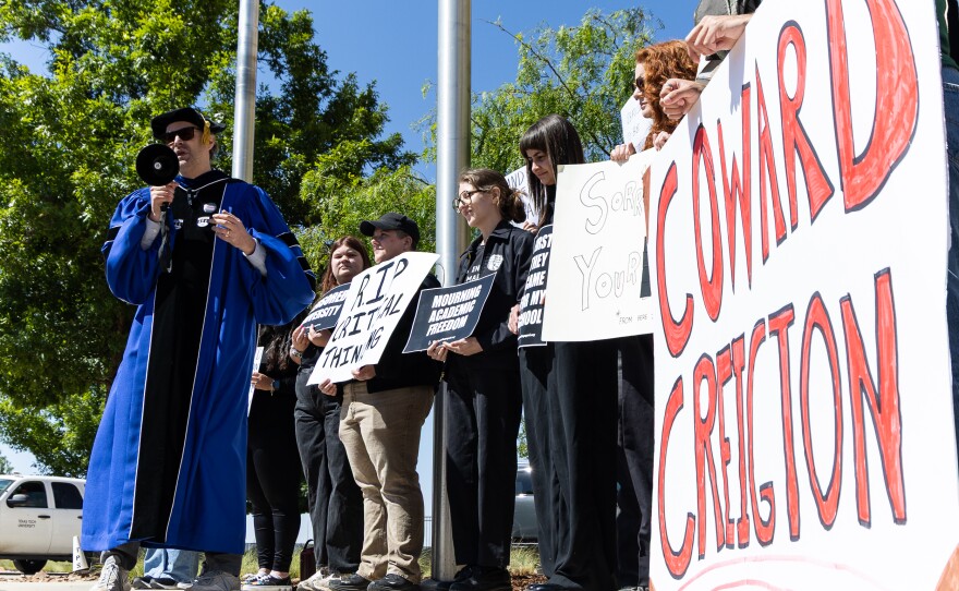 Students and faculty held a mock-funeral outside of the Texas Tech Board of Regents meeting on May 7 in protest of recent policy changes which they claim are acts of academic censorship.