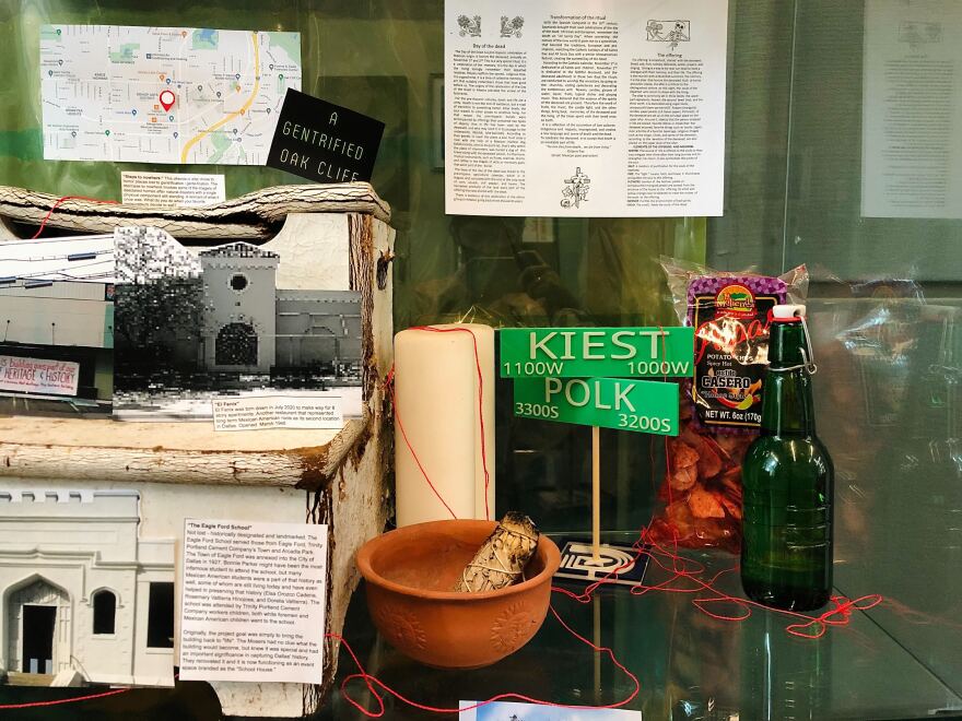 "I grew up in Oak Cliff," said Victoria Ferrell-Ortiz. "I was thinking of the places that are significant to us...a few of them have been lost." To the left of the altar is a wooden-building-cut-out that represents an Oak Cliff business that closed during the pandemic.