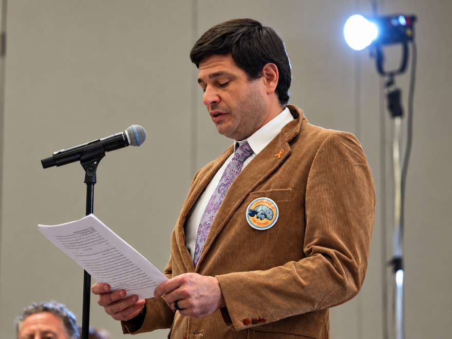 Kyle Huneycutter, of Maitland, spoke against the state's proposed removal of school entry vaccine mandates during a public hearing at the Orlando Mariotte Lake Mary hotel.