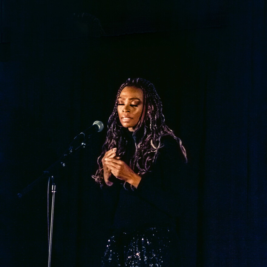 Tasha Jones tells her story at Bombyx, as part of Valley Voices' "Family Drama" story slam