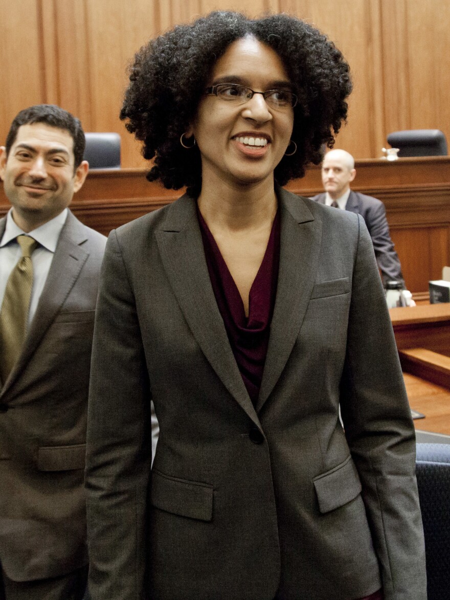 Leondra<strong> </strong>Kruger, right, and newly appointed Justice Mariano-Florentino Cuellar, left, stand during Kruger's confirmation hearing to the California Supreme Court Monday, Dec. 22, 2014.