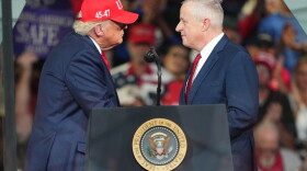 Michael Whatley and President Trump greet each other during a campaign rally at the Gastonia Municipal Airport, Wednesday, Sept. 16, 2026, in Gastonia, N.C.