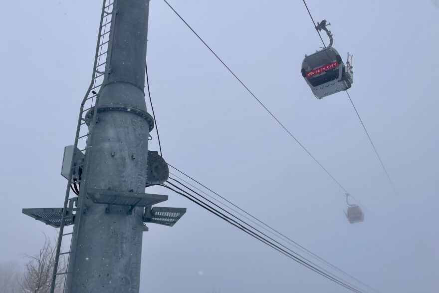 FILE - Quicksilver gondola cabins emerge from the fog at Park City Mountain in March 2024.