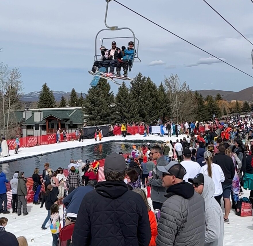 People gather at the base of Park City Mountain Resort's Eagle lift Saturday for the pond skim.