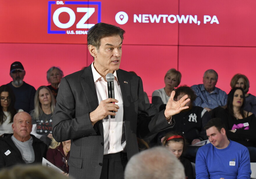Mehmet Oz, the TV celebrity and heart surgeon who is running for the Republican nomination for U.S. Senate in Pennsylvania, speaks at a town hall-style event at the Newtown Athletic Club, Feb. 20, 2022, in Newtown, Pa.