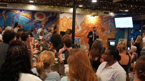 Tallahassee City Commissioner and Mayoral candidate Jeremy Matlow talks to supporters at his Gaines Street Pies restaurant in Midtown after it became clear he would be making it to a runoff in November