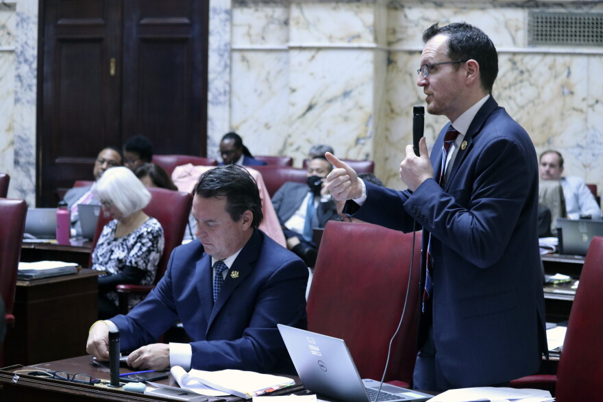 Maryland Sen. Justin Ready, right, a Republican, argues in favor of an amendment to the state budget to set aside $300 million for future tax relief for senior citizens instead of future K-12 education costs during debate on Wednesday, March 22, 2023 in Annapolis, Md. The amendment, which was rejected, was sponsored by Sen. Steve Hershey, an Eastern Shore Republican who is seated left of Ready. (AP Photo/Brian Witte)