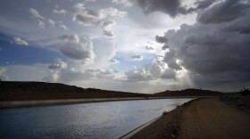 Water flows along the All-American Canal, Aug. 13, 2022, near Winterhaven, Calif. The canal conveys water from the Colorado River into the Imperial Valley. Arizona, California and Nevada on Monday, May 22, proposed a deal to significantly cut their water use from the drought-stricken Colorado River over the next three years.  