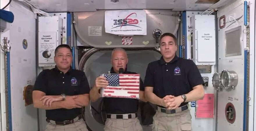 (L to R) NASA astronauts Bob Behnken, Doug Hurley and Chris Cassidy on board the International Space Station. Photo: NASA TV