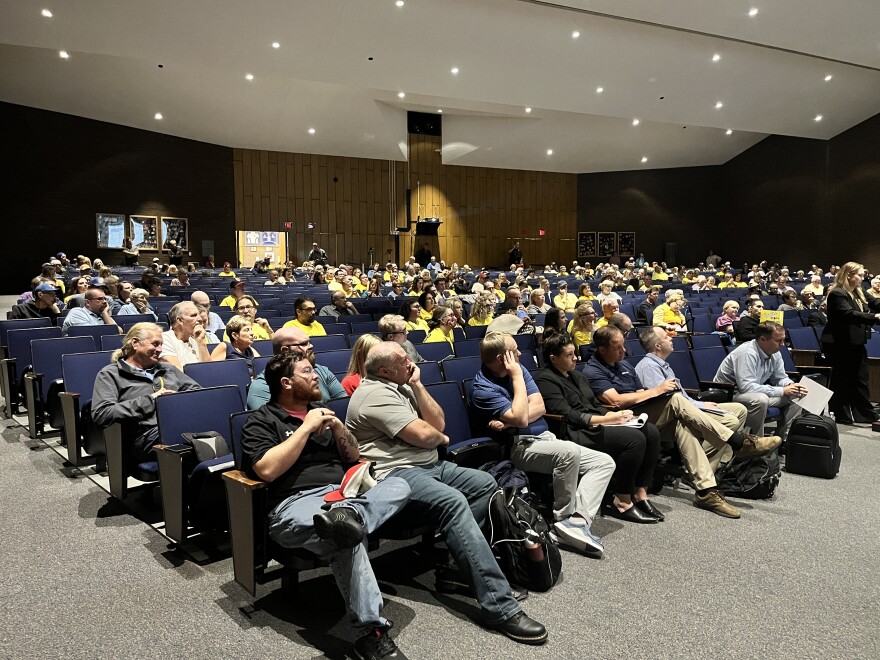 Hundreds of residents listen to testimony from a public health expert during a zoning hearing for a data center proposal in Archbald.