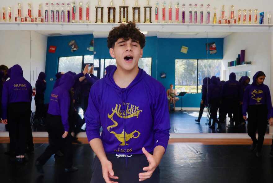 Melody Lane Performing Arts Center student Jonathan Serrat belts a number during competition at Junior Theatre Festival in Atlanta.