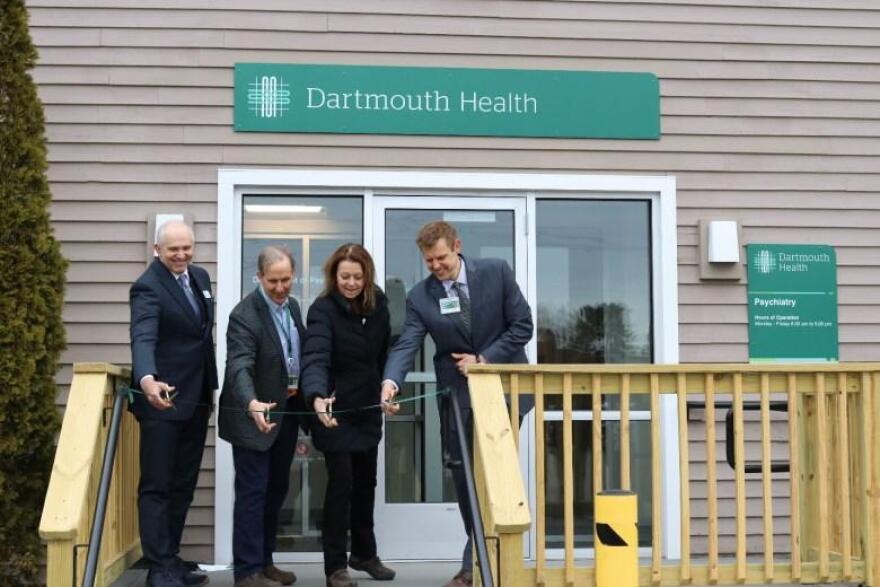 From left, Valley Regional Hospital CEO and president Matthew R. Foster, MD, MMM, Dartmouth Health psychiatry chair William C. Torrey, MD, Dartmouth Health CEO and president Joanne M. Conroy, MD, and Dartmouth Health addiction psychiatry chief Luke J. Archibald, MD, cut the ceremonial ribbon at the grand opening of the Claremont Addiction Treatment Program.