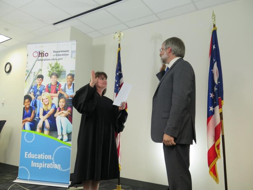 DeMaria takes his oath as State Superintendent of Instruction. [photo: Michelle Faust/ ideastream]