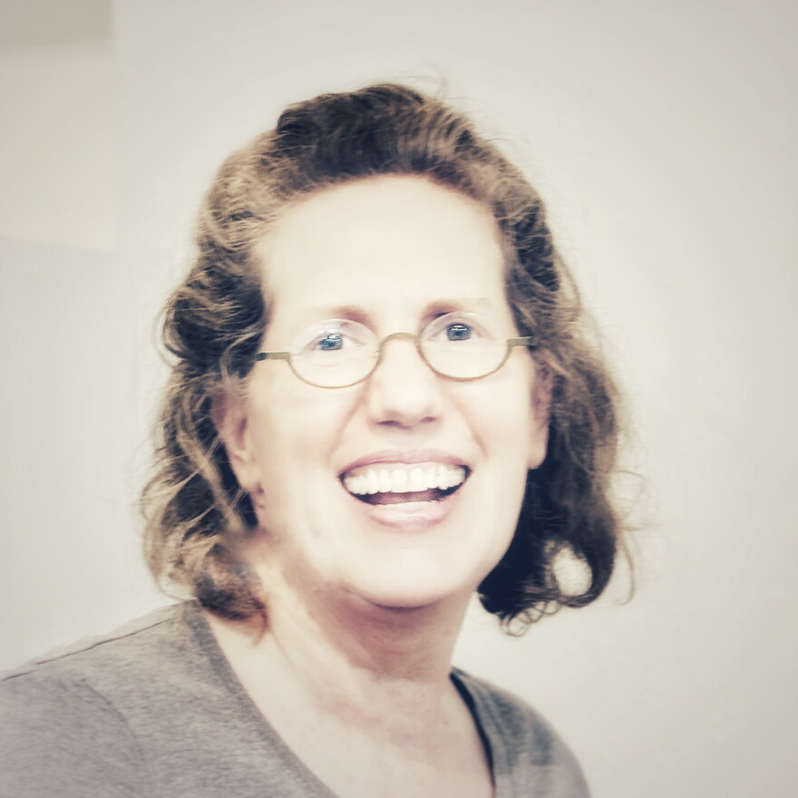 Portrait of Susan Appleton Chapin, Assemblage Artist (white, female, fifty-ish, big smile, blue eyes)