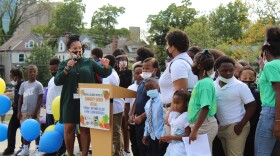 Rockdale Academy Principal Dr. Jaren Finney invited students on the stage to celebrate the new Urban Learning Garden on Sept. 30, 2021.