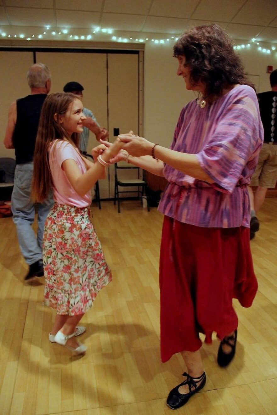 Carol Shepherd (left) dances to Spring in Sebastopol with her partner. The dance has two hand turns and all the beginning moves have nine counts. (Ybik Gaviria/WUFT News)