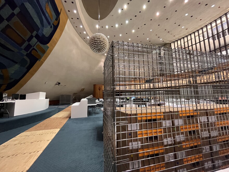 Pre-processed primary election ballots sit locked up in the Hawaiʻi State Capitol ahead of the election on Saturday, Aug. 13.