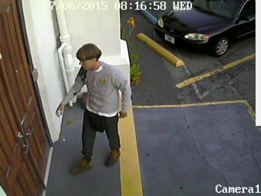 Police described the suspect as a white man in his 20s. He was seen entering the church before the shooting.