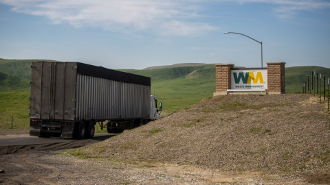 A truck drives through the entrance of the WM-Kettleman Hills Hazardous Waste Facility outside of Kettleman City on Jan. 13, 2026.