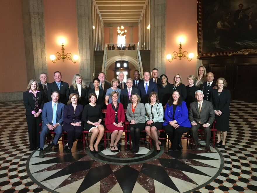 Gov. Mike DeWine poses with his appointed cabinet members.