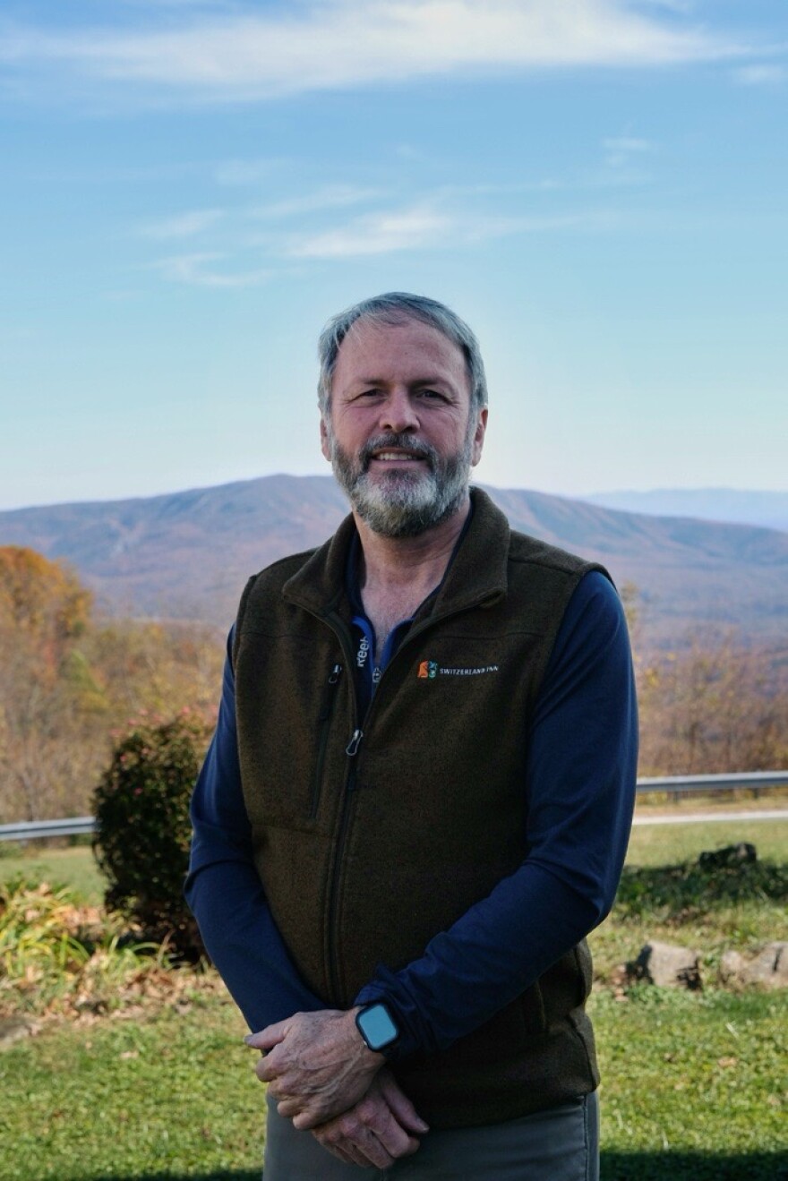Dave Roe, who helps manage the Switzerland Inn, poses for a portrait at the hotel.