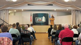 Nature Is Nonpartisan Founder Benji Backer speaks to folks assembled at the Belle Fourche Community Hall on Thursday.