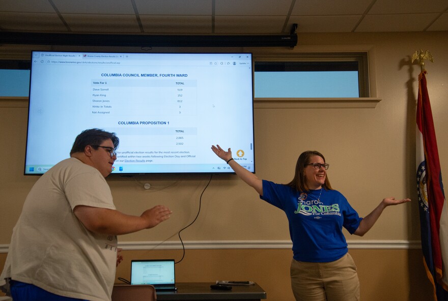 Sharon Jones, right, gestures to the election results screen after Aubrey Smith refreshed the website Tuesday at the LiUNA Local 955 building in Columbia. Jones won the Fourth Ward seat on the Columbia City Council on Tuesday. Jones is a civil rigts attorney and has been practicing law for more than 20 years.