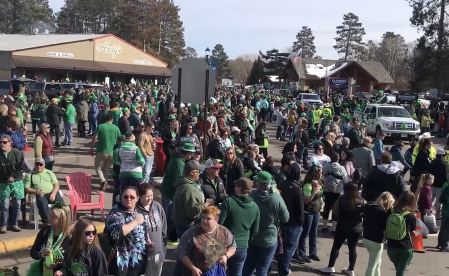 Crowds gather along the parade route in Crosslake during the St. Patrick's Day parade in 2022.