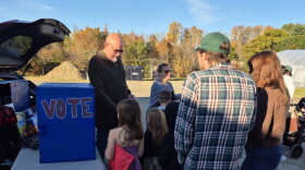 Democratic candidate for New York state Senate Devin Lander campaigns at a ‘Trunk or Treat’ event on Sunday, Oct. 18, 2026 in Rensselaer County, just outside Troy. Lander is vying to unseat incumbent Republican Sen. Jake Ashby.
