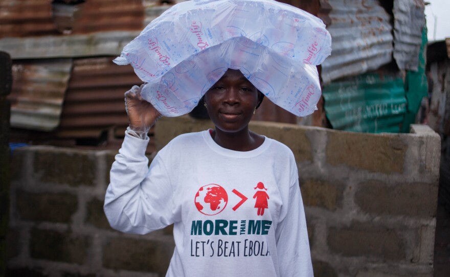 Let's beat Ebola! Since August, the nonprofit More Than Me switched its focus from educating girls to getting Ebola out of the West Point neighborhood. Krubo is a social worker with the group who helps teach people about Ebola.