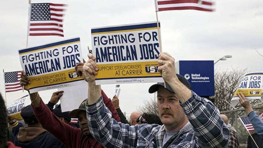 Union workers rally outside the Indianapolis Carrier plant.