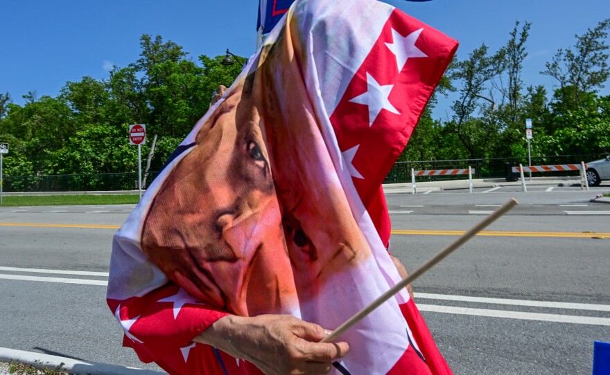 Trump supporters caravan near his Mar-a-Lago resort in West Palm Beach, Fla, on Sunday.