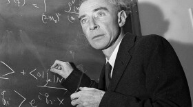 FILE-This Dec. 15, 1957 file photo Dr. J. Robert Oppenheimer, creator of the atom bomb, is shown in his study at the Institute for Advanced Study, in Princeton, N.J. The U.S. Department of Energy has declassified documents related to the Cold War hearing on Oppenheimer who directed the Manhattan Project and was later accused of having communist sympathies. The department last week released transcripts of the 1950s hearings on Oppenheimer's security clearance, providing more insight into the previously secret world that surrounded development of the atomic bomb. (AP Photo/John Rooney, File)