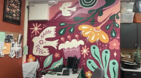 After their art classroom flooded, Riverside University High School art teacher Paige Bauske and her students painted this mural to bring color and new life back into the space. Many of the art materials were lost in the August 2025 floods.
