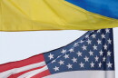 Ukrainian and U.S. flags fly in Kyiv, Ukraine.