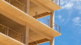 Experts say mass timber combines ancient natural principles with modern engineering, offering a safer, greener future for building construction. (Adobe Stock)