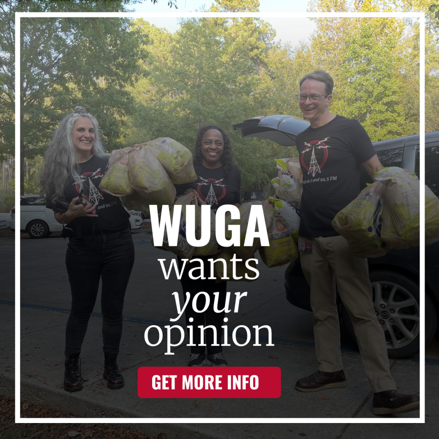 Two woman and a man holding bags of popcorn. There is text that says WUGA wants your opinion laid across the top.
