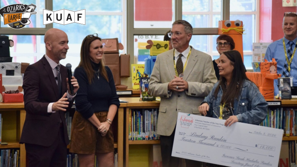 Education Secretary Jacob Oliva (left) addresses a crowd following the announcement of Lindsay Rankin (far right) as the 2027 Arkansas Teacher of the Year. Gov. Sarah Huckabee Sanders and Springdale School District Superintendent Jared Cleveland listen during the surprise ceremony at Bernice Young Elementary School on Oct. 8, 2026.