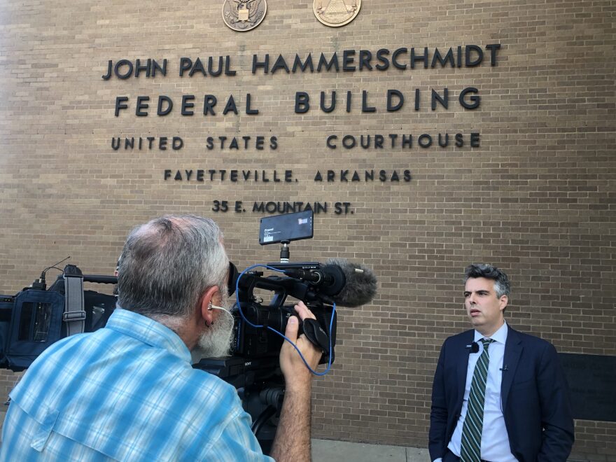 ACLU of Arkansas Legal Director John Williams talks to reporters outside of the John Paul Hammerschmidt Federal Building on July 18, 2025.
