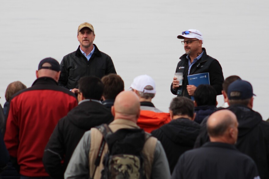 Matt Kissinger and Brendan Duval talk to a group about Cook Inlet during an Alaska LNG Project event on Monday, May 18, 2026 in Nikiski, Alaska.