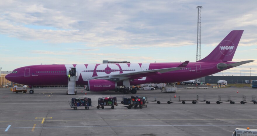 A WOW Air plane stops on the tarmac at Keflavik International Airport in Iceland. [Leonard Zhukovsky / Shutterstock]