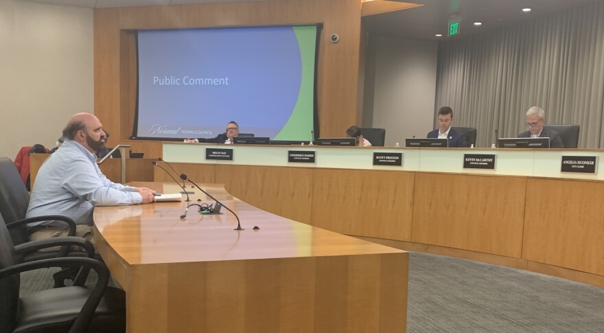 Karl Sila, a candidate for Normal Town Council, addresses the council during public comment, during its meeting Monday, March 20, 2023, at Uptown Station.