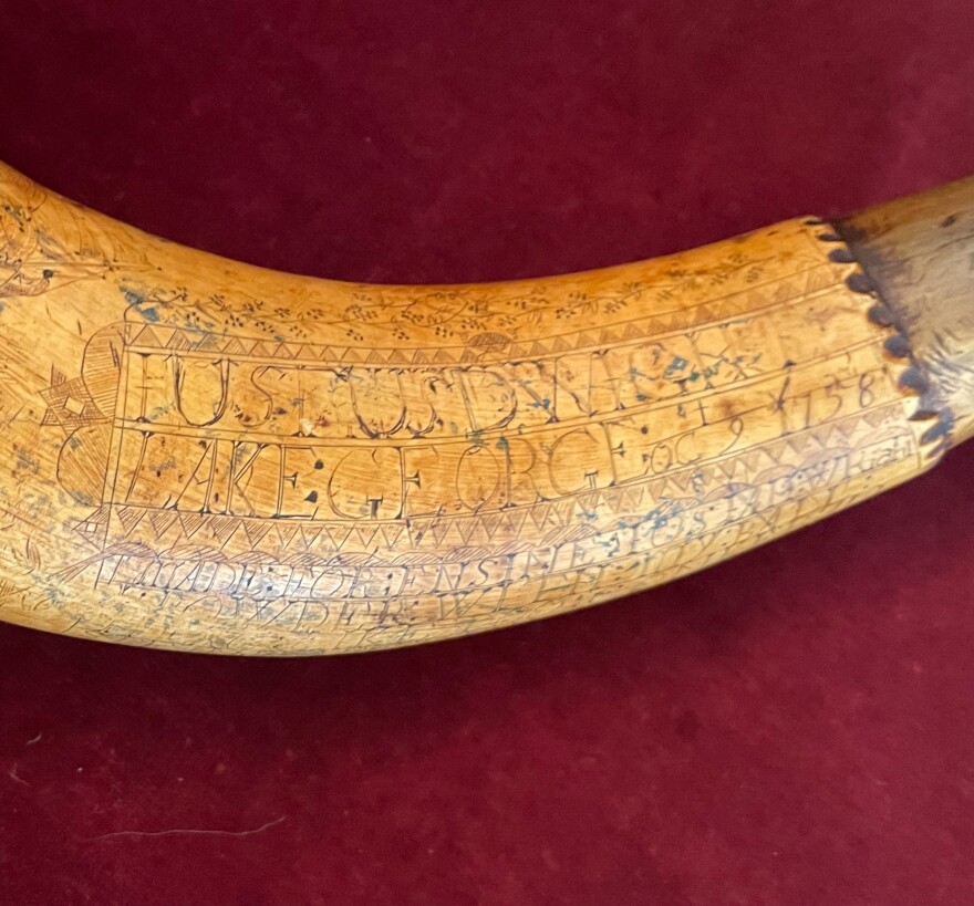 A 1758 engraved powder horn owned and carried by Justus Dwight in the French and Indian War.