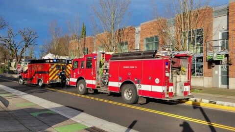 An ambulance and Eugene Springfield Fire Department engine respond to a call in downtown Eugene in December, 2024.
