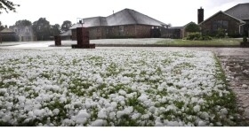 A yard in Midwest City is covered with hail stones after a severe hail storm hit areas of eastern Oklahoma County, including these homes in the Windsong neighborhood, near SE 15 and Westminster, late Sunday afternoon, May 16, 2010.