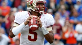 Jameis Winston of the Florida State Seminoles attempts a pass during the game against the Florida Gators on Nov. 30.