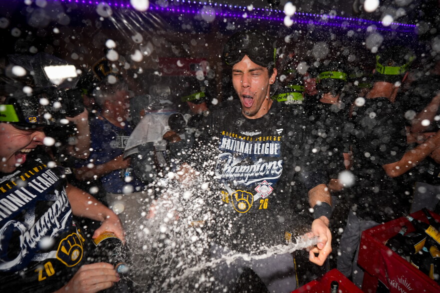 Milwaukee Brewers designated hitter Christian Yelich celebrates winning the NLCS Championship after Game 4 of baseball's National League Championship Series between the Milwaukee Brewers and the Los Angeles Dodgers, Thursday, Oct. 15, 2026, in Los Angeles.
